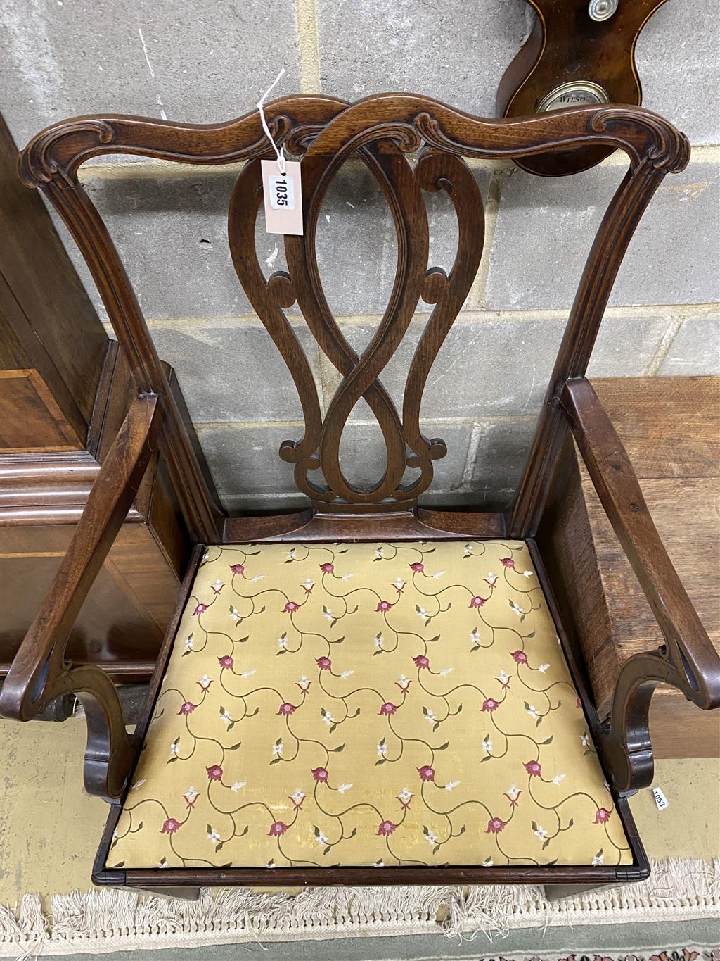 A George III Hepplewhite style mahogany elbow chair